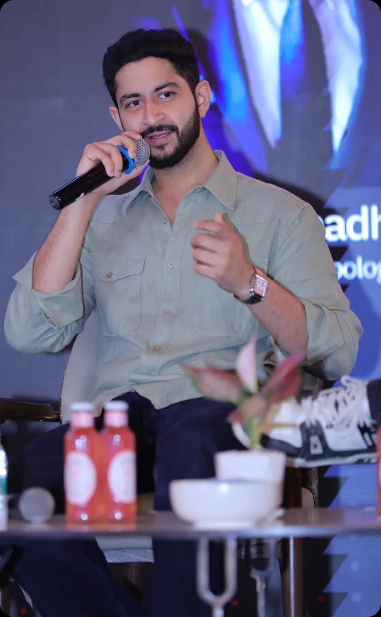 A speaker answering questions on stage